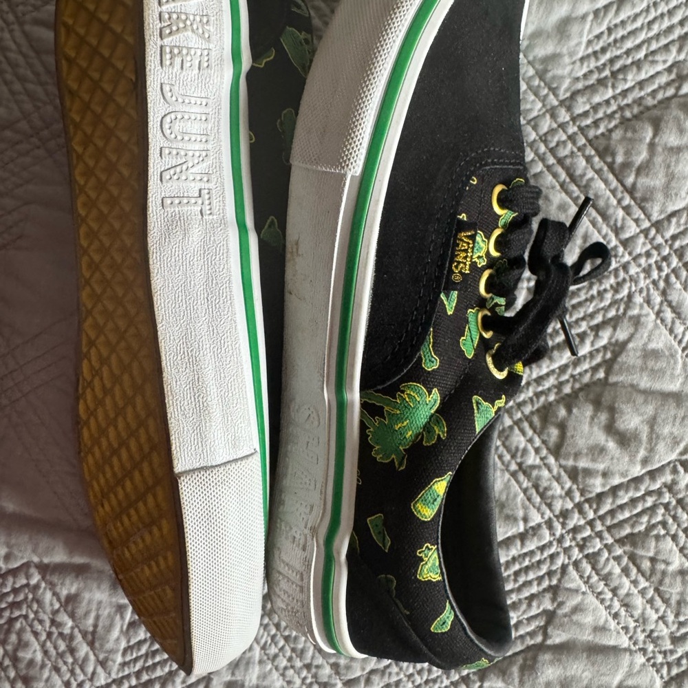 Vans Black and Green Athletic Shoes with Camouflage Pattern